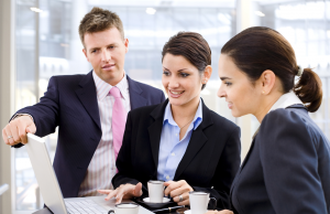 three professionals in meeting - management resume
